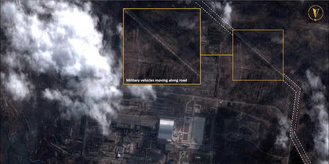 A satellite image with overlayed graphics shows military vehicles next to the Chernobyl nuclear power plant, in Chernobyl, Ukraine on February 25, 2022. 