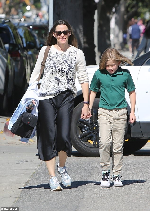 Exhilarated: Jennifer and Samuel were spotted hanging out this afternoon in Los Angeles