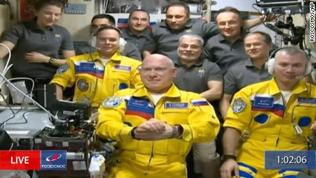 Russian cosmonauts raise speculation after arriving at the International Space Station in the colors of Ukraine