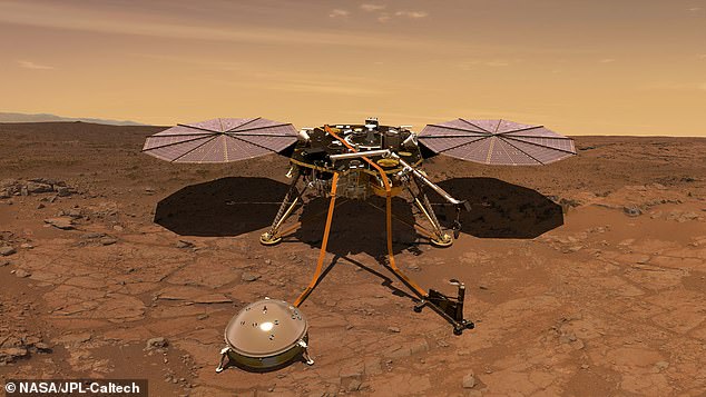 New research has revealed previously undetected earthquakes beneath the surface of Mars, which experts believe is evidence that it hosts a sea of ​​magma in its mantle.  Pictured is an artist's rendering of the InSight lander, which has been 'taking the heartbeat of Mars' since landing on the planet in 2018.