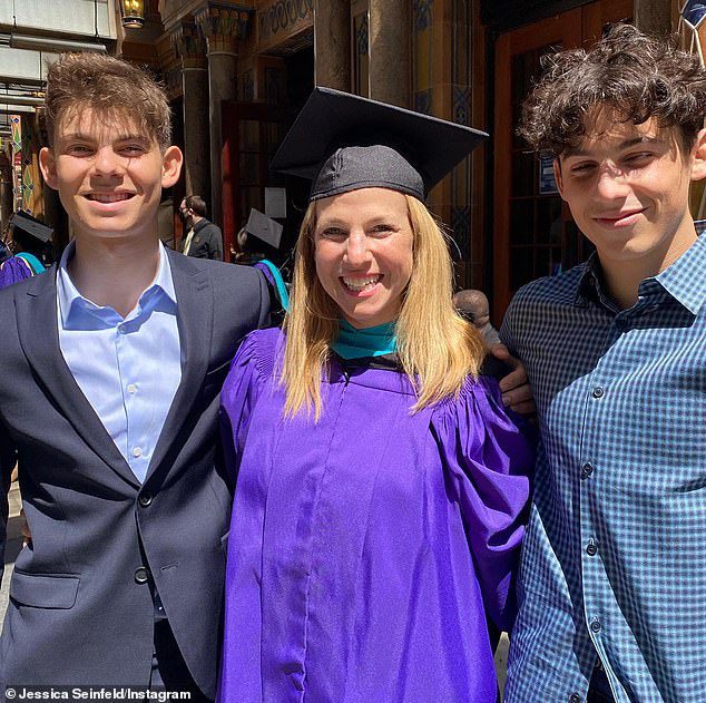 HAPPY MOTHER: Jessica - who shares three children with Jerry - posted one photo of herself with sons Julian (right), 19, and Sheppard (left), 16, who are joined