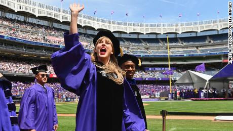 Taylor Swift waves at the Graduation Party during New York University's 2022 Graduation Ceremony.