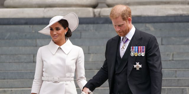 Meghan Markle and Prince Harry leave the National Thanksgiving service at St Paul's Cathedral during Queen Elizabeth's platinum jubilee.