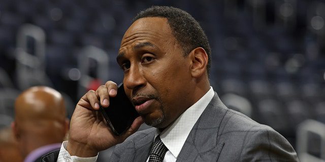 ESPN's Stephen A. Smith talks on his phone during Game Two of the 2022 NBA Finals between the Boston Celtics and the Golden State Warriors on June 5, 2022 at Chase Center in San Francisco, California.