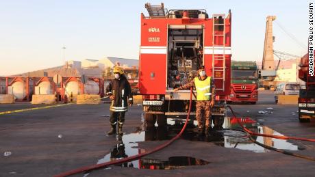 Emergency response teams respond to a toxic gas leak at the port of Aqaba in Jordan on Monday.