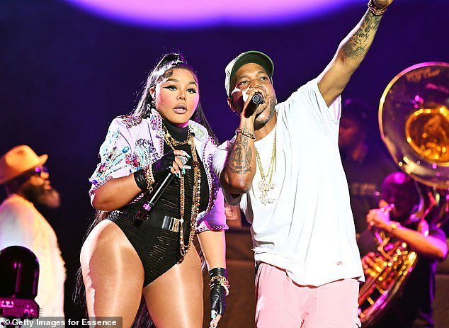 Performance: Rapper Lil' Kim attended the Essence Culture Festival as well where she sang alongside Styles P of The Roots
