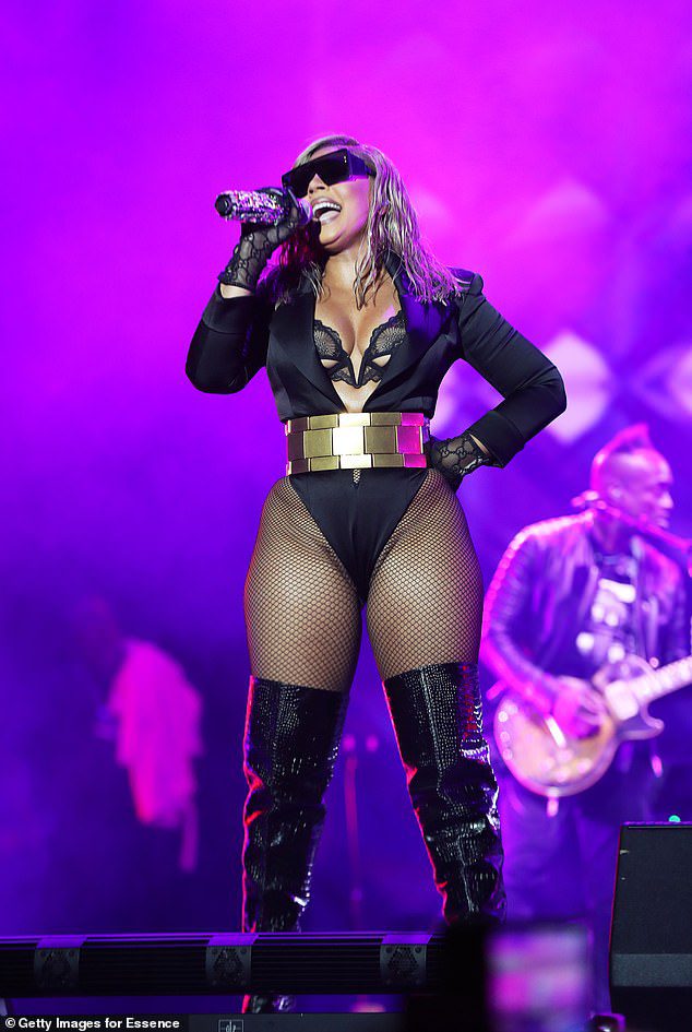 Bodycon dresses: Singer and actress Ashanti also wore dresses, one more revealing than Lil' Kim