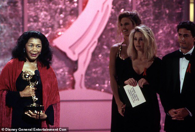 Thanks!  Alice accepts an Emmy Award at the 45th Annual Primetime Emmy Awards in Pasadena, California;  Right: Heather Locklear and Andrew Shaw from Melrose Place