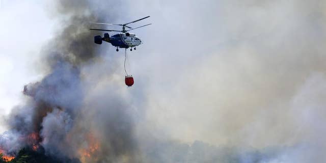 Wildfires are burning as parts of Spain are grappling with a record heat wave. 