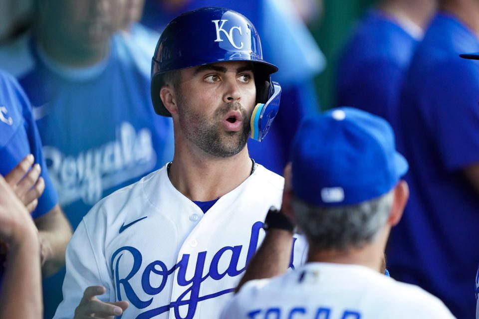 KANSAS CITY, MO - JUNE 28: White Merryfield #15 of the Kansas City Royals celebrates with his teammates after scoring his first game against the Texas Rangers during the third inning at Kauffman Stadium on June 28, 2022 in Kansas City, Missouri.  (Photo by Kyle Rivas/Getty Images)