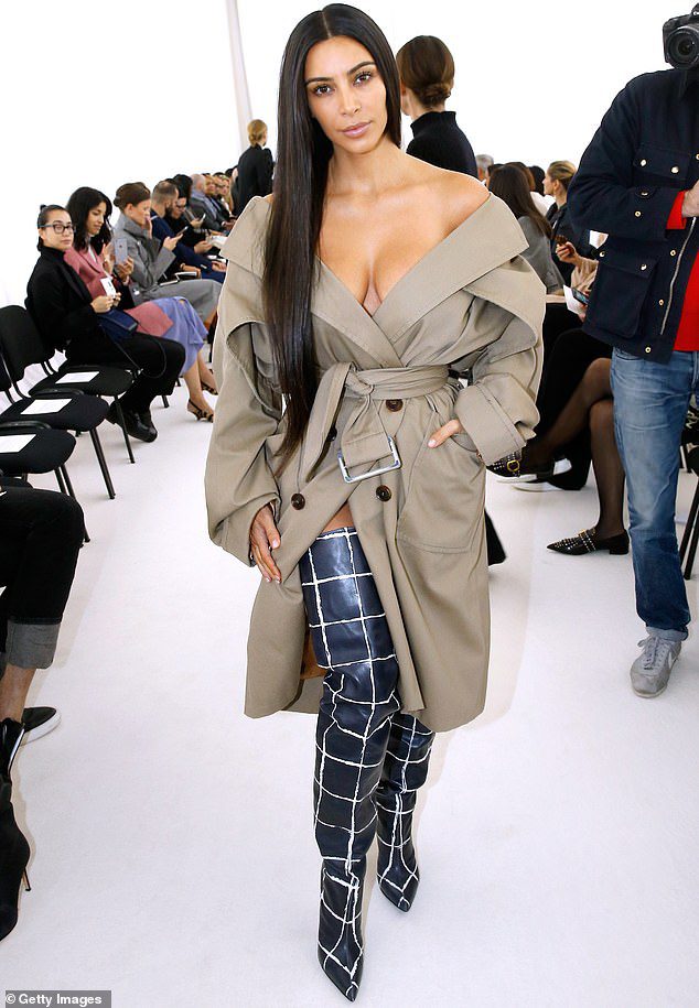 Before that: Kim was tied at gunpoint and $10 million worth of jewelry stolen in October 2016 while attending Paris Fashion Week, where she was photographed at the Balenciaga show.
