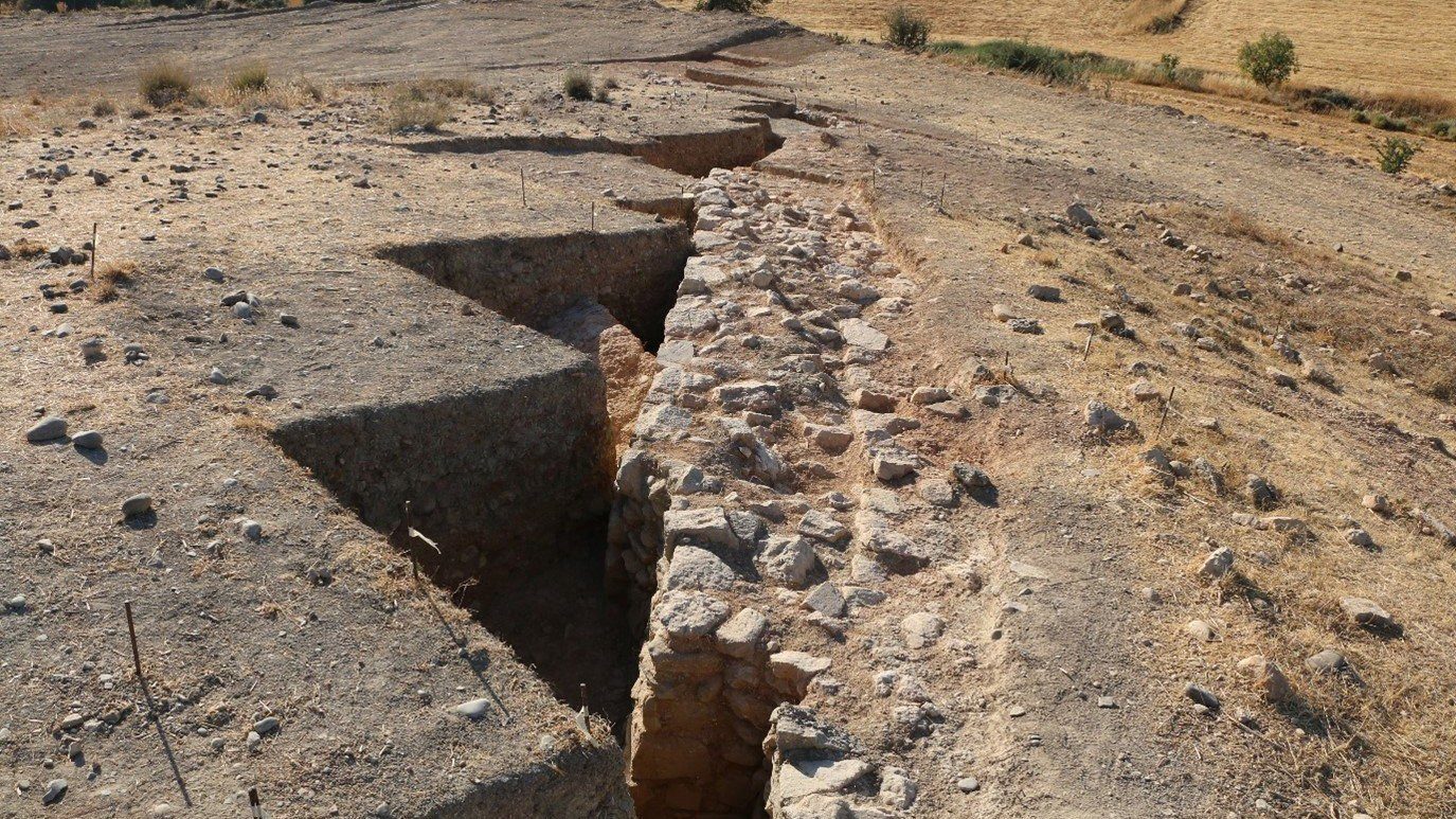 Broken wall hidden under an ancient cemetery in Cyprus.