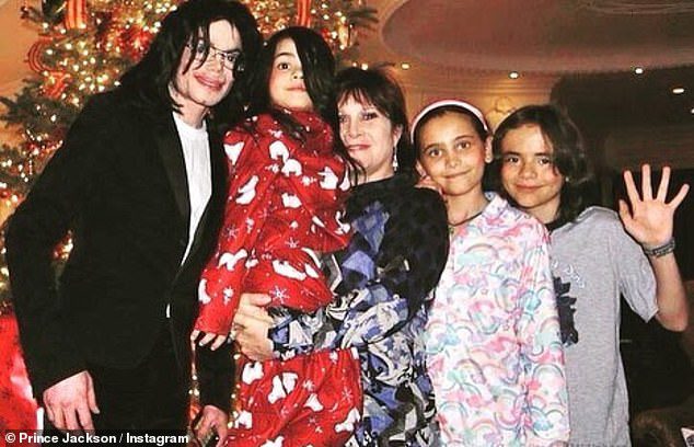 Family time: Prince, the 25-year-old son of the bad singer (far right) has shared a series of flashback photos on social media.  He is seen here with his father, younger brother Prince Michael, also known as Plunkett, and sister Paris