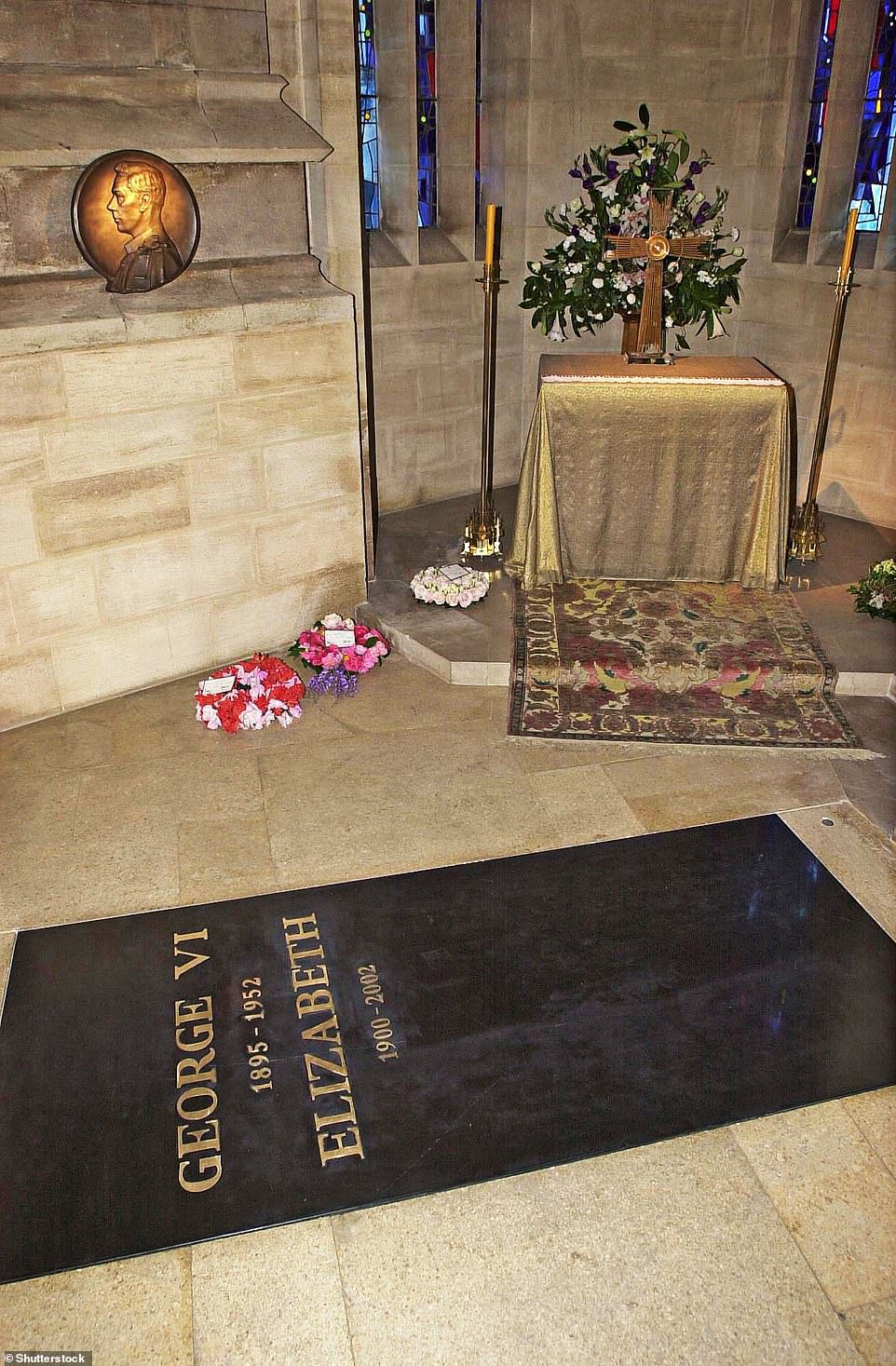 Her Majesty the Queen is interred alongside her husband Prince Philip and her parents King George VI and Queen Elizabeth the Queen Mother.  Pictured: A stone at St George VI Memorial Chapel at St George's Chapel in Windsor, where the Queen Mother is buried in 2002