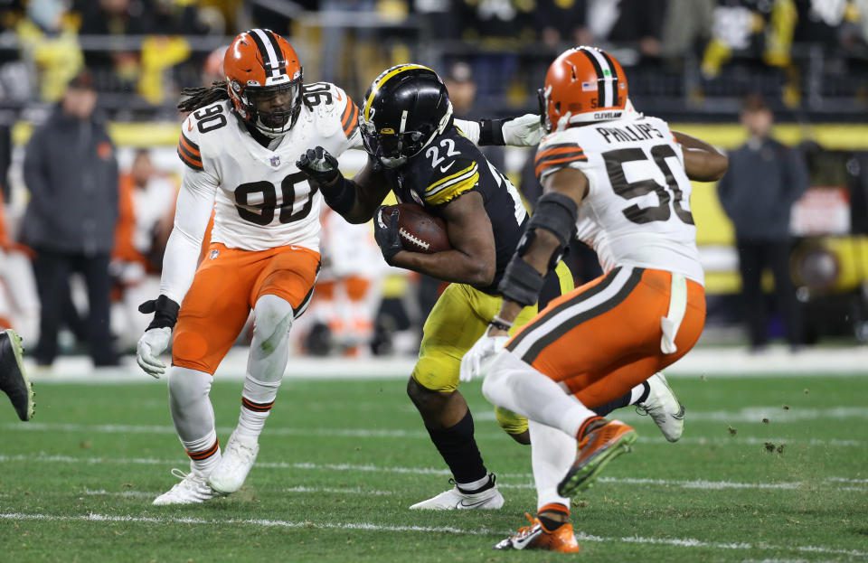 January 3, 2022;  Pittsburgh, Pennsylvania, USA;  Pittsburgh Steelers running back Nagy Harris (22) runs the ball against Cleveland Browns defensive end Jadivion Clooney (90) and linebacker Jacob Phillips (50) during the second quarter at Heinz Field.  Mandatory credit: Charles LeClaire-USA TODAY Sports Amazon Prime