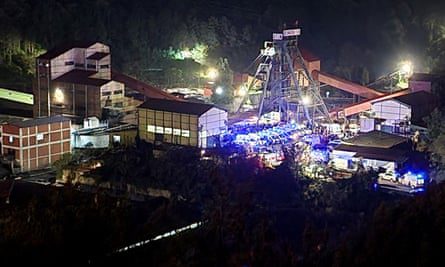 Ambulances and firefighters arrive at the coal mine site.