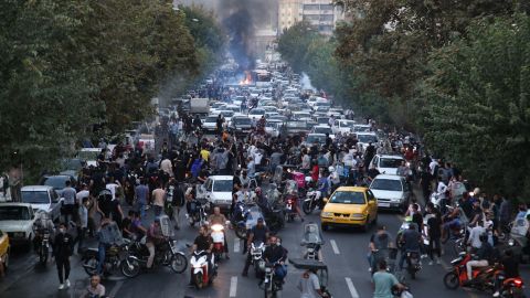 A photo obtained by AFP outside Iran on September 21, 2022, shows Iranian protesters on the streets of Tehran during a protest by Lamhasa Amini, days after her death in police custody.