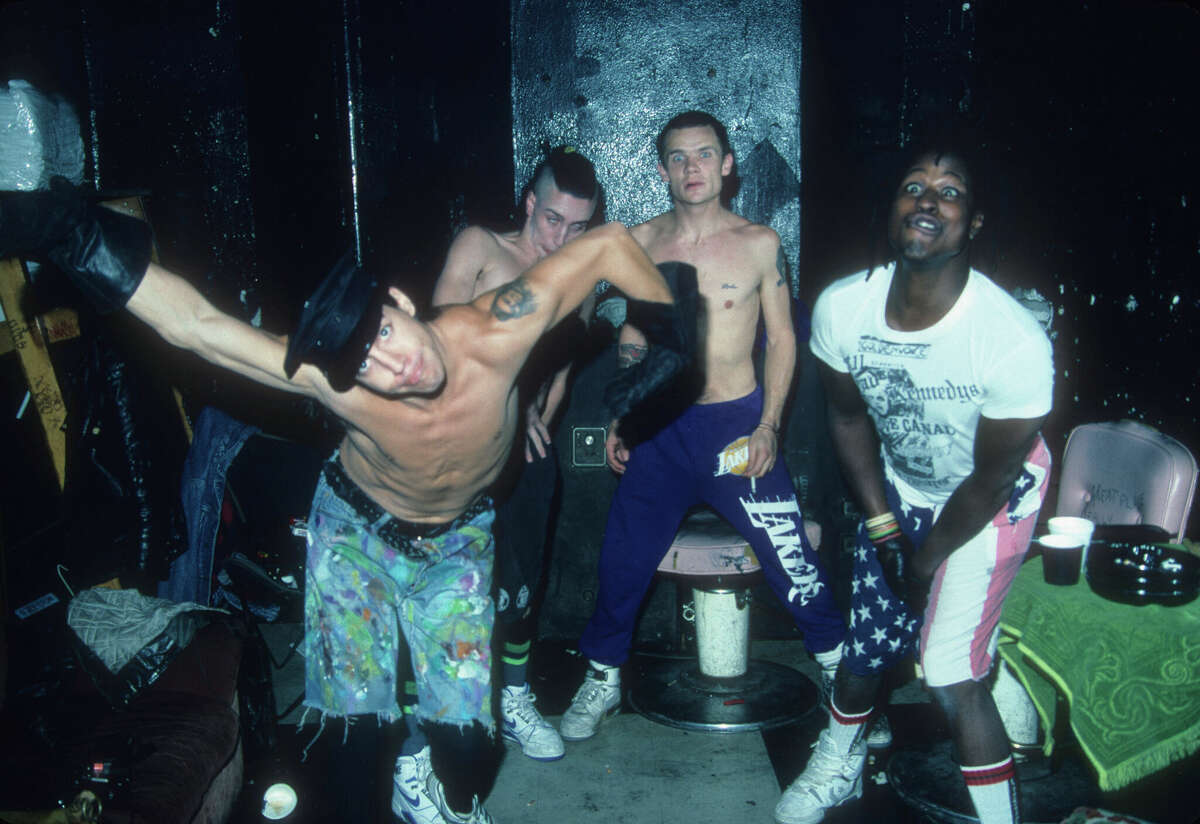 Red Hot Chili Peppers (LR) Anthony Kiedis, John Frusciant, Michael "flea" Balzary, D. H. Peligro poses for a behind-the-scenes photo at First Avenue nightclub in Minneapolis, Minnesota on November 16, 1988. 