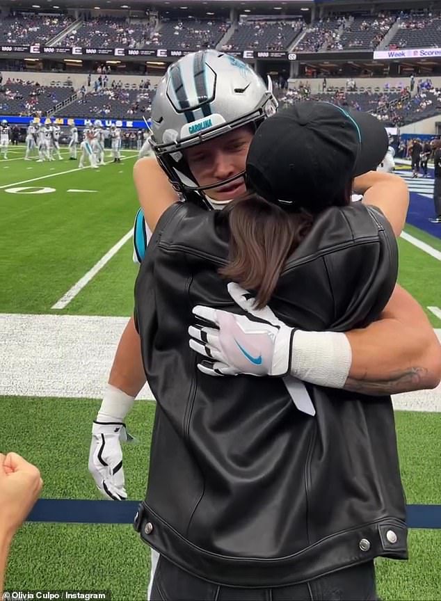 Proud of her man: Olivia shares an emotional video congratulating her running star boyfriend McCaffrey on his trade from the Panthers to the 49ers
