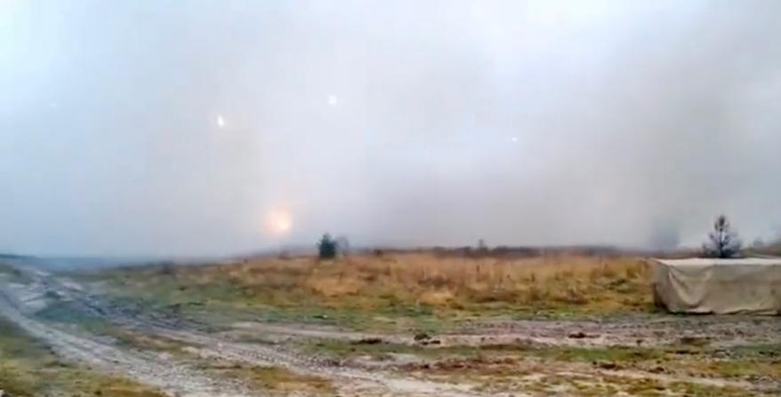 Picture of hundreds of artillery being fired.