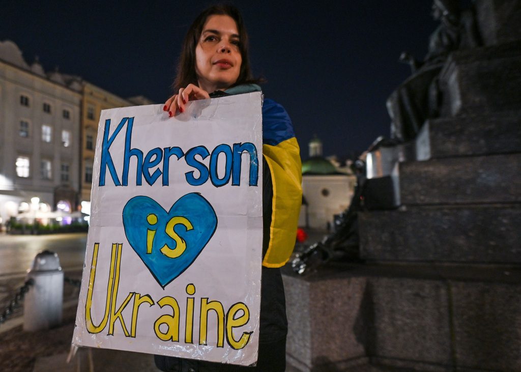 A Ukrainian demonstrator is seen during a solidarity protest with Ukraine in Krakow's main square.
